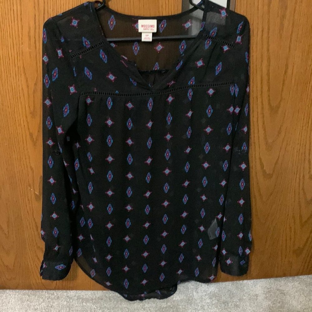 Women’s long sleeved, sheer blouse